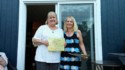 Linda gets her certificate making her an honorary Newfoundlaner